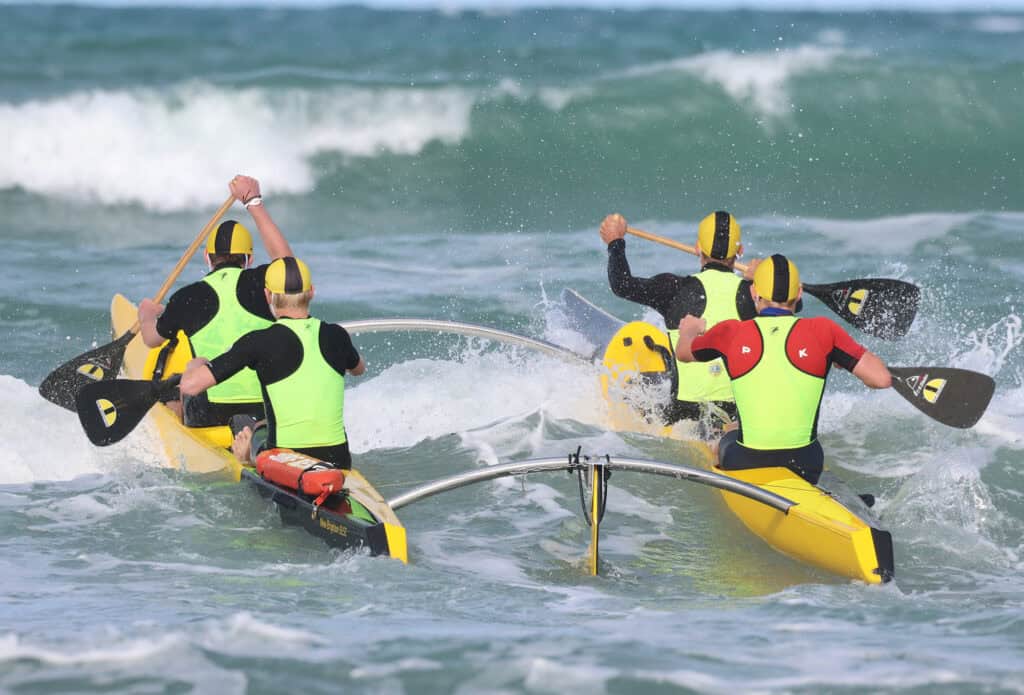 WildCat fibreglass surf canoes