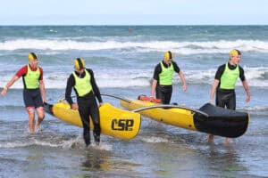 The WildCat surf canoe in the surf